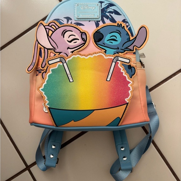 Loungefly Blue and Pink Backpack with Playful Design - Picture 1 of 3